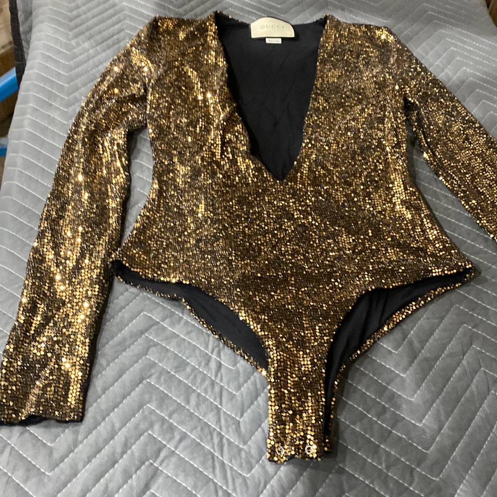 Gold sequins bodysuit made by Gucci, used once